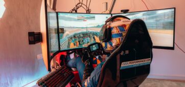 sim racing direct drive wheel cockpit experience