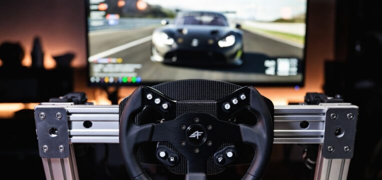 Direct drive wheel and aluminum rig setup explaining why sim racers buy the wrong wheel first